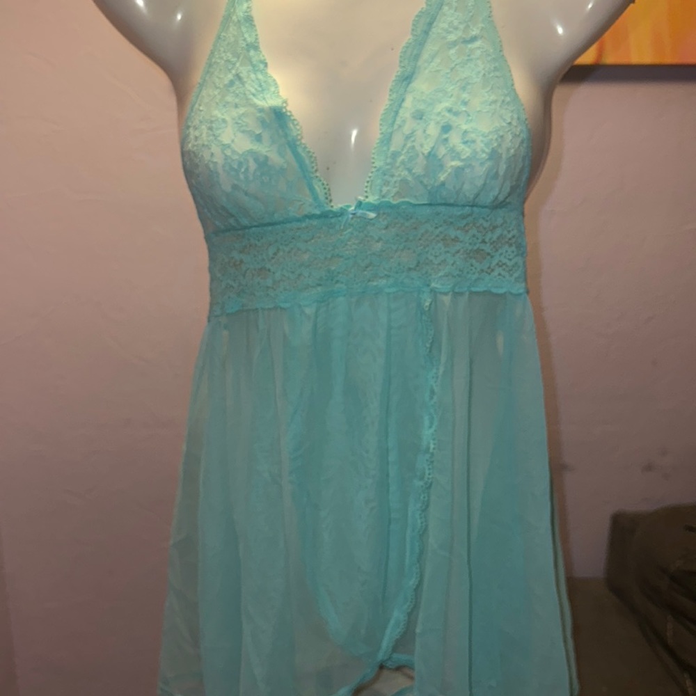 A women’s shirt that’s is sky blue and is Victoria NEW WITH NO TAGS